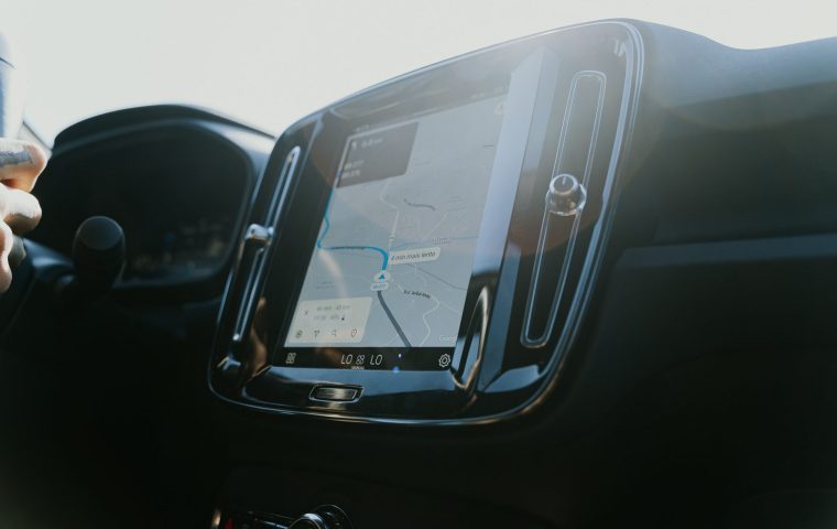 Built-In Nav vs Phone Maps: Which Should You Trust on a Road Trip?