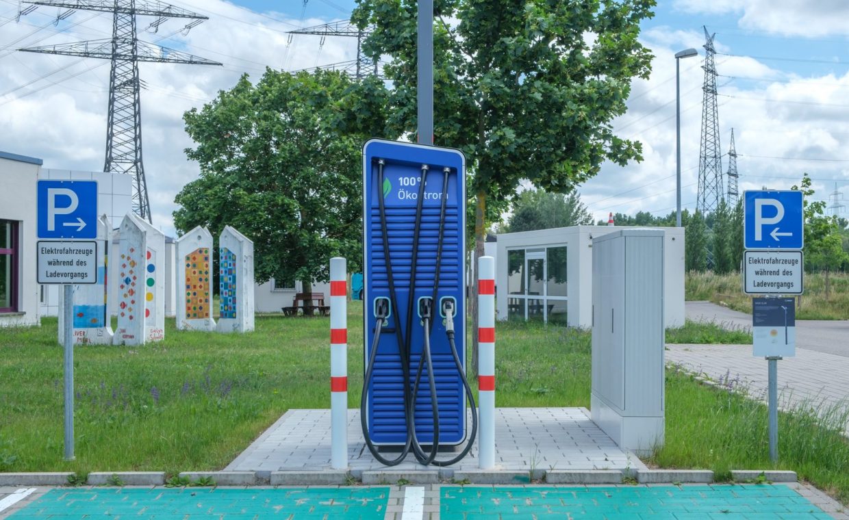 Public charging station with eco-friendly design for electric vehicles.
