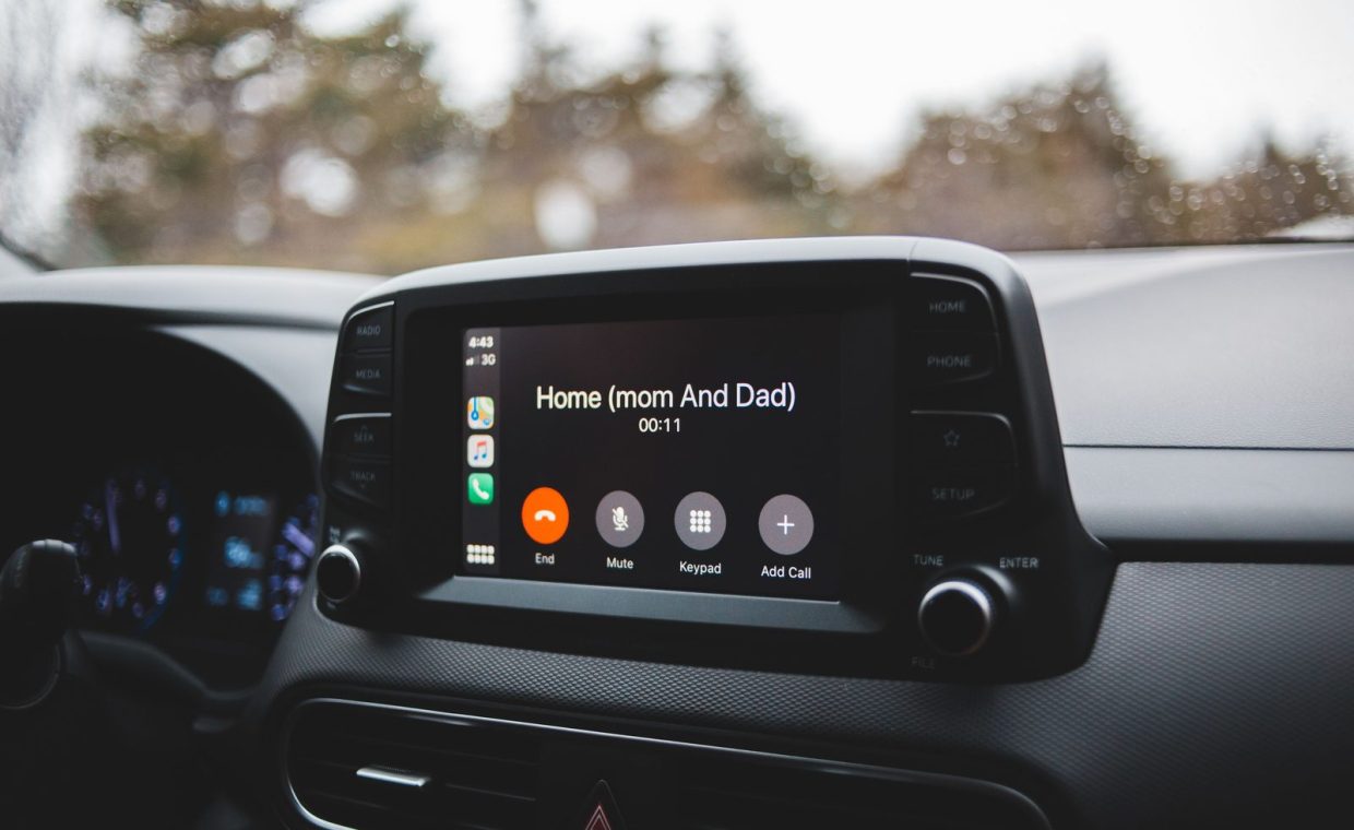 Screen of modern multimedia system in car with hand free call to home