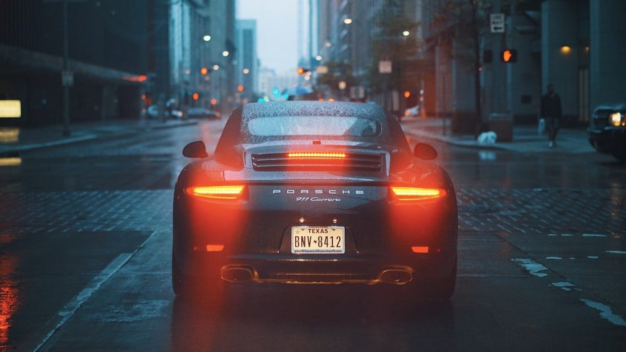 gray Porsche car on road