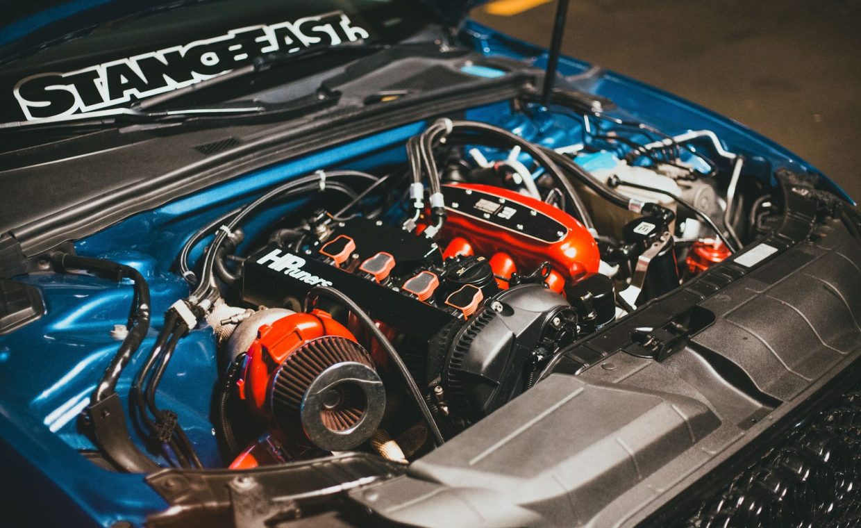 Detailed view of a customized car engine with performance modifications.