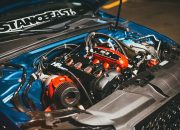 Detailed view of a customized car engine with performance modifications.