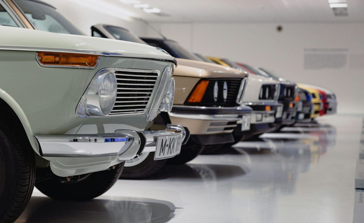 selective focus photography of assorted-color vehicles