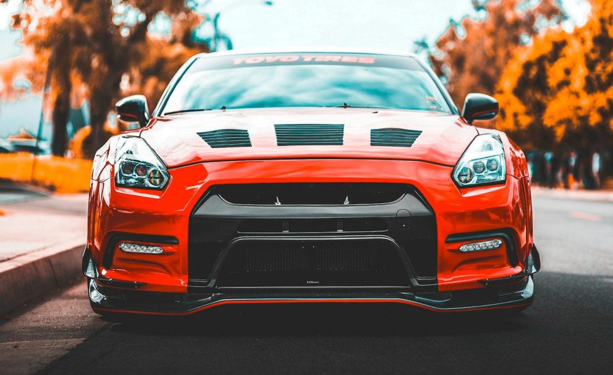 red car near trees