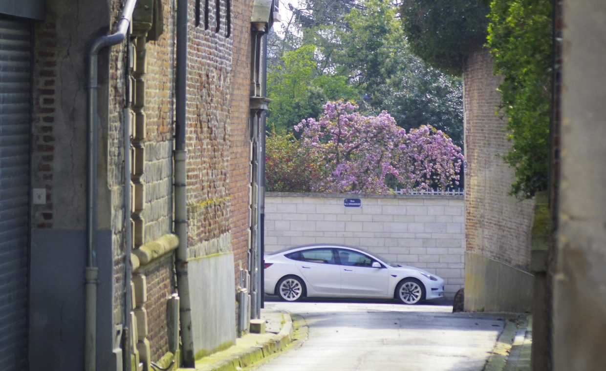 a car is parked on the side of the road
